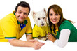 Brazilian couple and pet supporters